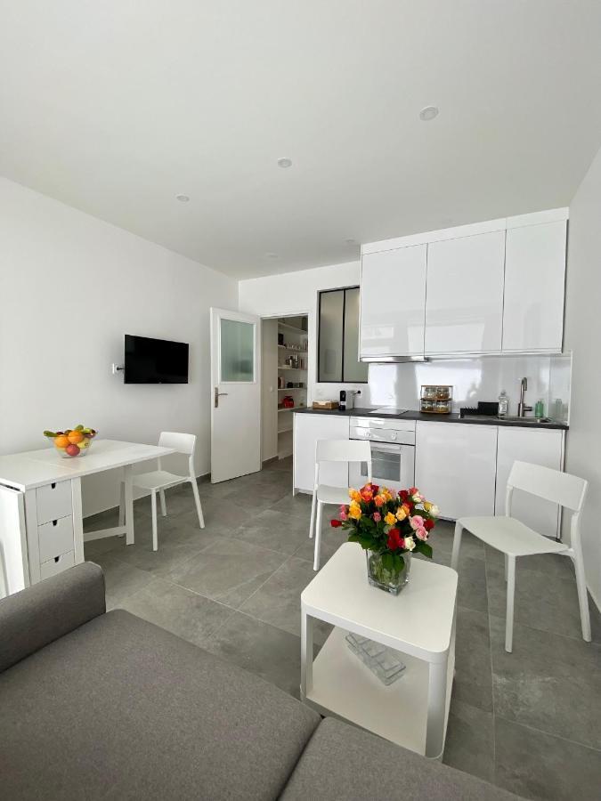 Chez Les Artistes De Menilmontant Apartment Paris Bagian luar foto