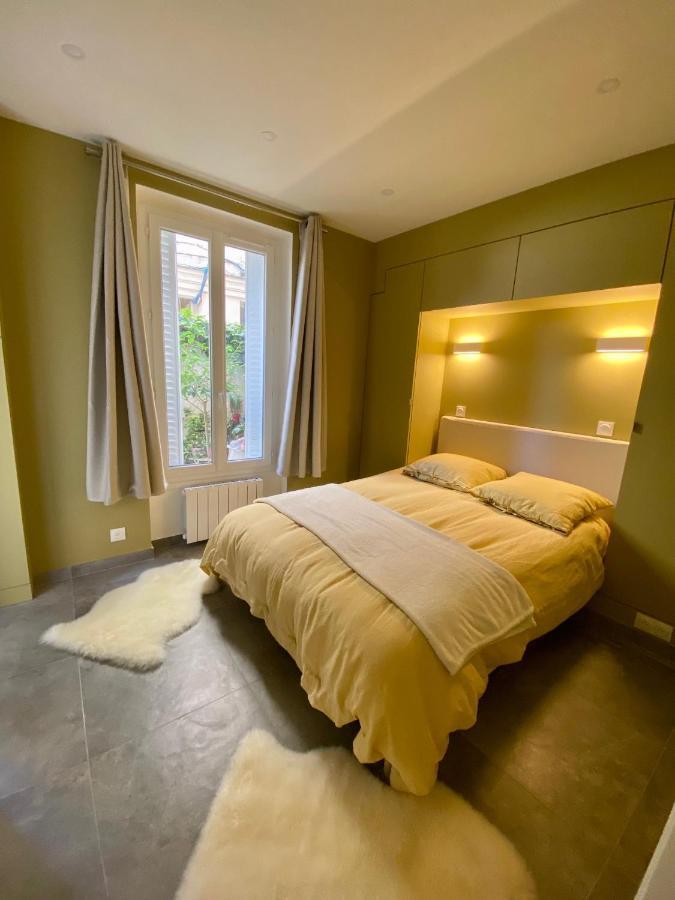 Chez Les Artistes De Menilmontant Apartment Paris Bagian luar foto