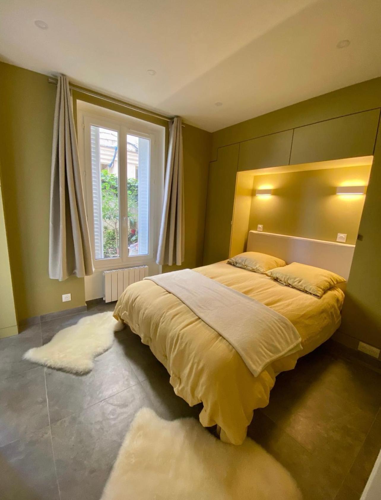 Chez Les Artistes De Menilmontant Apartment Paris Bagian luar foto